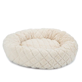 Gemütliches cremefarbenes Haustierbett mit einem plüschigen, gesteppten Design, perfekt für kleine Hunde oder Katzen.