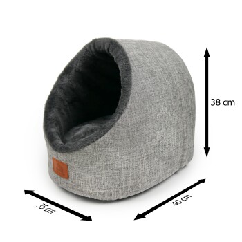 Graues Haustierhöhlenbett mit weichem Innenraum, 40 cm breit, 35 cm lang und 38 cm hoch, mit einem Lederlogo-Patch.