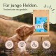 Ein golden retriever Welpe mit geschlossenen Augen neben einer Tüte "Huhn" Hundefutter, mit Symbolen für Wachstumsunterstützung und getreidefrei.