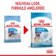 Deux sacs de nourriture pour chiens Royal Canin étiquetés "JUNIOR GIANT" et "JUNIOR 8-18/24 mois," avec une flèche rouge pour une nouvelle formule.