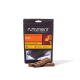 Schwarze Nutriment Natural Treats-Tüte mit Aufschrift 'Huhn' (Hähnchen), Hunde-Kopf-Abbildung und zwei braunen Trainingsriegeln vorne.