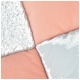 Close-up of a soft pet blanket featuring a patchwork design in pastel pink and blue colors, with varying textures.