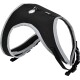 Black and gray pet harness with a mesh design, featuring a silver emblem and adjustable straps for comfort and security.