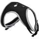 Black and gray pet harness with a mesh design, featuring a silver emblem and adjustable straps for comfort and security.