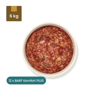 Gefrorenes Haustierfutterpaket mit der Aufschrift "BARF Komfort PLUS Pferd, 500 g" mit einer Schüssel des gleichen Futters, das Fleisch- und Gemüsestücke enthält, und einem "12x"-Abzeichen.