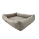 Ein gemütliches, rechteckiges Haustierbett mit weichem, geripptem Stoff in neutralem Beige, mit erhöhten Rändern für zusätzlichen Komfort.