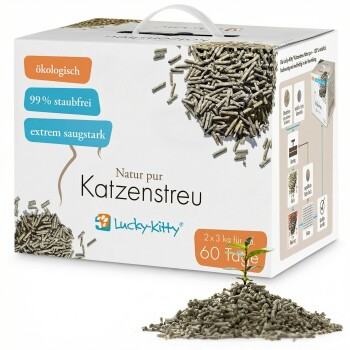 Lucky-Kitty Katzenstreu-Box mit verschütteten Granulatpellets und einem Spross; Etiketten: ökologisch, 99% staubfrei, 2×3 kg/60 Tage