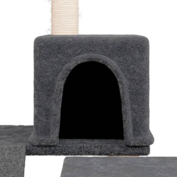 Graues Katzenhaus mit einem runden Eingang und einem Kratzbaum oben, auf einer weichen grauen Matte platziert.