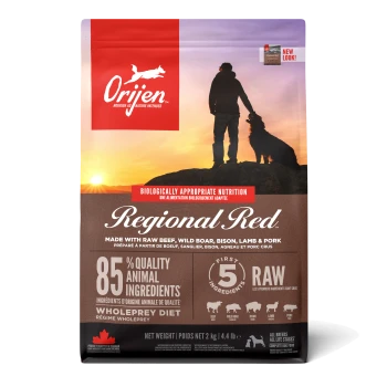 Sac de nourriture pour chiens Orijen Regional Red avec un fond de coucher de soleil, mettant en avant "85% d'ingrédients animaux de qualité" et "régime wholeprey."