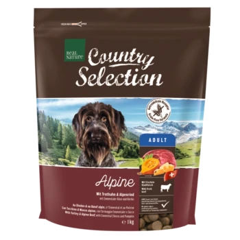 Brązowa torba z jedzeniem dla psów oznaczona "Country Selection" z obrazkiem psa, stwierdzająca "Alpine" i "Adult", zawierająca indyka, wołowinę, ser i dynię.