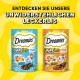 Deux paquets de friandises Dreamies : bleu "Festival de Fruits de Mer" et orange "Picnic de Volaille", tous deux avec des chats de dessin animé et "Nur 2 kcal pro Stück!" sur jaune.