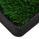 Künstlicher Gras-Haustier-Pott mit einer schwarzen Kunststoffbasis, ausgestattet mit üppigem grünem synthetischem Gras für den Innen- oder Außenbereich.