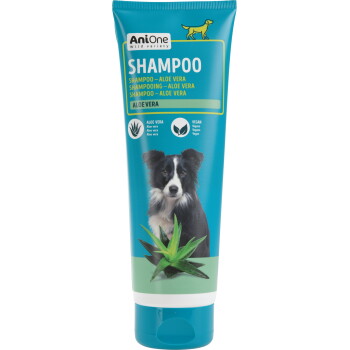 Tube de shampooing AniOne pour chien - étiquette 'SHAMPOO' turquoise, mention 'Aloe Vera', icône vegan, photo de chien et plante d'aloès.