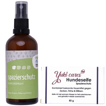 Eine braune "Spazierenschutz Kokosspray"-Flasche für Zecken- und Flohschutz neben einer weißen "Yuki cares Hundeseife"-Seifenbox mit Anweisungen.