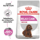 Torba karmy dla psów Royal Canin Relax Care dla psów średniej wielkości, różowo-biała, z ilustracją psa i twierdzeniem o +44% skuteczności.