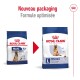 Deux sacs de nourriture pour chiens Royal Canin côte à côte : "MAXI Adult 5+" et "L maxi adult 5+" avec "Nouveau packaging" et "Formule optimisée."