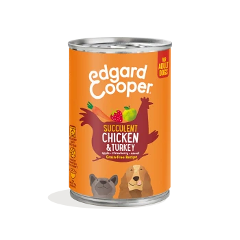 Can of Edgard Cooper dog food featuring "Succulent Chicken & Turkey" with apple, strawberry, and carrot. Grain-free recipe.