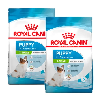 Zwei Tüten Royal Canin Welpenfutter für X-Small Rassen, geeignet für Welpen im Alter von 2-10 Monaten, mit einem Gewichtslimit von 4 kg.