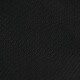 Teksturowane tło z czarnej tkaniny z subtelnym wzorem siatki.
