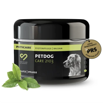 Schwarzes und grünes Glas von Petcare Petdog Care 2103 Balsam für die Pfotenpflege, mit einer Hundesilhouette und einem Blatt daneben.