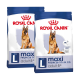 Twee zakken Royal Canin hondenvoer voor grote rassen, gelabeld 'maxi' en 'adult 5+', geschikt voor honden die 26 tot 44 kg wegen.