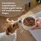 Ein heller Hund frisst braune Kroketten aus einer Edelstahlschüssel. Text: "Getreidefreies, hypoallergenes Futter für Hunde mit empfindlichem Magen."