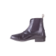Schwarze Reitstiefel mit Reißverschluss und elastischen Seitenpaneelen, mit einem niedrigen Absatz und glatter Oberfläche.