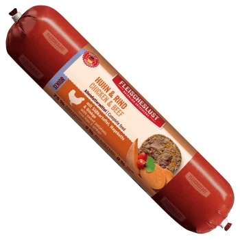 Fleischeslust Futterbox, Holzbox mit Aufschrift 'Natürlich & Artgerecht' und 'Huhn & Rind' (Chicken & Beef), rote Futterrolle.