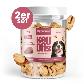 Glas mit KAU DAS Hühnerherz-Hundeleckerlis, 60g, mit einem glücklichen Hund auf dem Etikett, mit dem Text "Training & Belohnung" und "100% Fleisch."