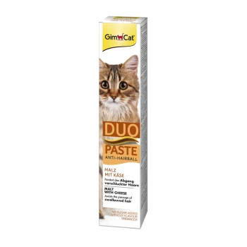 Pasta GimCat Duo przeciwko kulkom włosowym dla kotów, z twarzą kota na opakowaniu, z tekstem w języku niemieckim i angielskim o jej korzyściach.