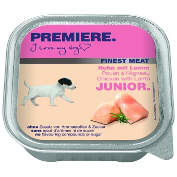 Hundefutterverpackung mit einem verspielten Welpen, beschriftet mit "Premiere. Ich liebe meinen Hund," mit "Feinstes Fleisch" und "Huhn mit Lamm Junior."