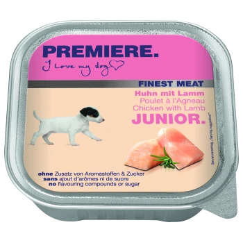 Hundefutterverpackung mit einem verspielten Welpen, beschriftet mit "Premiere. Ich liebe meinen Hund," mit "Feinstes Fleisch" und "Huhn mit Lamm Junior."