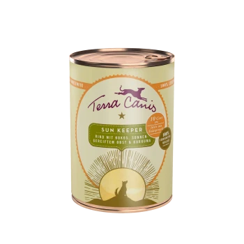 Eine Dose Terra Canis Hundefutter mit der Aufschrift "Sun Keeper", die ein Design mit der Silhouette eines Hundes vor einem Sonnenstrahlen-Hintergrund zeigt.