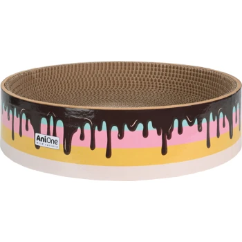 Colorful cat scratcher in a round shape, designed like a dessert with chocolate and pastel drips, labeled "AniOne Wild Variety."
