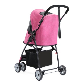 Rosa Haustierbuggy mit einem Netzoberteil, einem schwarzen Stauraum darunter und vier Rädern, von der Seite betrachtet.