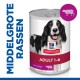 Blikvoer voor honden van Hill's Science Plan, gelabeld voor middelgrote rassen, met een lachende zwart-witte hond, met "ADULT 1-6" en "met RUNDVLEES."