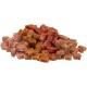 Une pile de petites friandises pour animaux de compagnie en différentes nuances de brun et de rouge, idéales pour les chiens ou les chats.