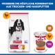 Hill's Science Plan Hundefuttersack (Adult 1–6) mit schwarz-weißem Hund und passender Dose Nassfutter mit Huhn.