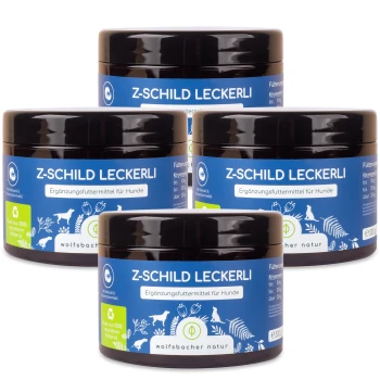 Vier Gläser "Z-Schild Leckerli", ein Hundesupplement, mit einem blauen Etikett mit weißem Text und Illustrationen von Hunden und Pflanzen.