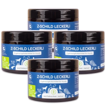 Vier Gläser "Z-Schild Leckerli", ein Hundesupplement, mit einem blauen Etikett mit weißem Text und Illustrationen von Hunden und Pflanzen.