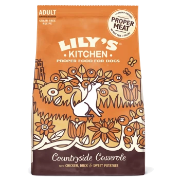 Lily's Kitchen grain-free dog food bag featuring a white dog in a floral design, labeled "Countryside Casserole" with chicken, duck & sweet potatoes.