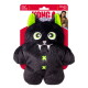 KONG black plush monster dog toy with bright green ears and eyes, white fangs, green X buttons on red package.