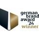 Logo des German Brand Award 24 mit einem stilisierten goldenen und schwarzen Emblem und dem Text 'german brand award 24 winner.'