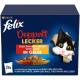 Boîte de nourriture pour chat Felix Doppelt Lecker avec un chat noir et blanc regardant à travers un papier déchiré et un bol de morceaux de viande en gelée.