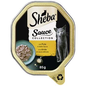 Sheba Sauce Collection Katzenfutterverpackung mit einer grauen Katze, mit Text, der "mit Pute in heller Sauce" und "85g" angibt.