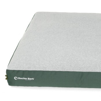 Graues Haustierbett mit grünem Rand, mit dem Logo "Doctor Bark" an der Seite.