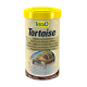 Conteneur de nourriture pour tortues Tetra, avec une image de tortue, étiqueté comme nourriture complète pour toutes les tortues, avec un texte multilingue sur la santé et la croissance.