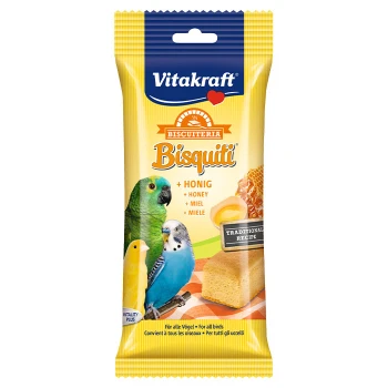 Vitakraft Bisquiti Vogelleckerlis Verpackung mit bunten Wellensittichen, Honig und einem Keks. Text: "+ Honig," "Traditionelles Rezept," "Vitalität Plus."