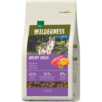 Zak Real Nature Wilderness Adult Rocky Hills hondenvoer met afbeelding van een wolf, illustratie van rundvlees en pompoen, 2,5 kg, tekst 65%/35%/0%.