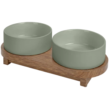 Pet food and water bowl set featuring two light green ceramic bowls on a wooden base.